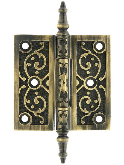 3 inch Solid Brass Steeple Tip Hinge With Decorative Vine Pattern in Antique Brass.